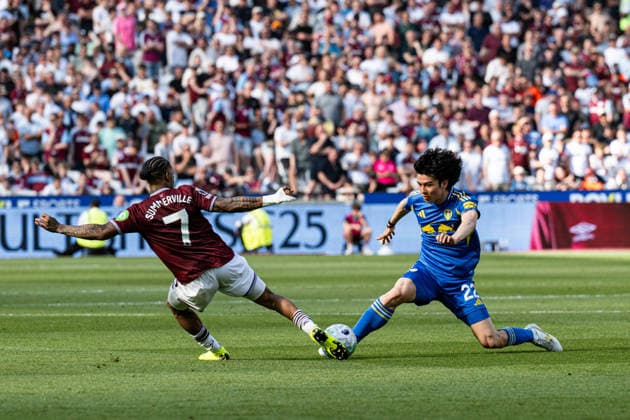 24th May 2026; London Stadium, London, England; Premier League Football, West Ham United versus Leeds United; Ao Tanaka of Leeds United tackles Crysencio Summerville of West Ham GodfreyxPitt