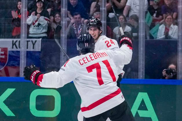 FRIBOURG, SWITZERLAND MAY 24 Macklin Celebrini of Canada L celebrates Dylan Cozens of Canada R for his goal during the 2026 IIHF Ice Hockey World Championship Switzerland game between Slovakia and Canada at BCF Arena on May 24, 2026 in Fribourg, Fribourg Fribourg BCF Arena Fribourg Switzerland Copyright: xJustPictures.ch JarixPestelaccix jp-en-EuSpIm-JP6_JAR_Slovakia_Canada_24May2026_00063