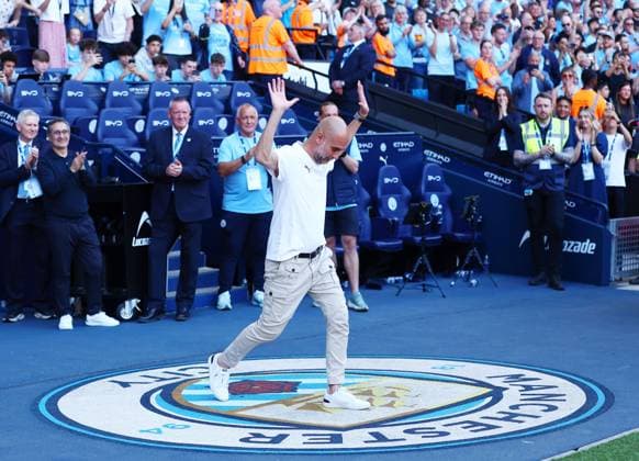 Manchester City manager Pep Guardiola walks across the club crest onto the pitch for the last time Manchester City v Aston Villa, Premier League, Football, Etihad Stadium, Manchester, UK - 24 May 2026Manchester Etihad Stadium United Kingdom EDITORIAL USE ONLY No use with unauthorised audio, video, data, fixture lists, club league logos or live services. Online in-match use limited to 120 images, no video emulation. No use in betting, games or single club league player publications.  Copyright: xMattxWest Shutterstockx 16889851bb