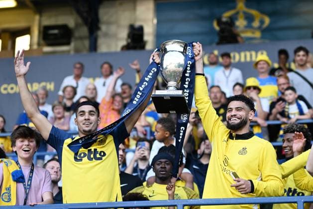 Union s Anan Khalaili and Union s Adem Zorgane celebrate with the Belgian Cup after a soccer match between Royale Union Saint-Gilloise and RSC Anderlecht, Sunday 24 May 2026 in Brussels, on the last day of the Champion s Play-offs of the 2025-2026 Jupiler Pro League first division of the Belgian championship. MAARTENxSTRAETEMANS  x174948717x