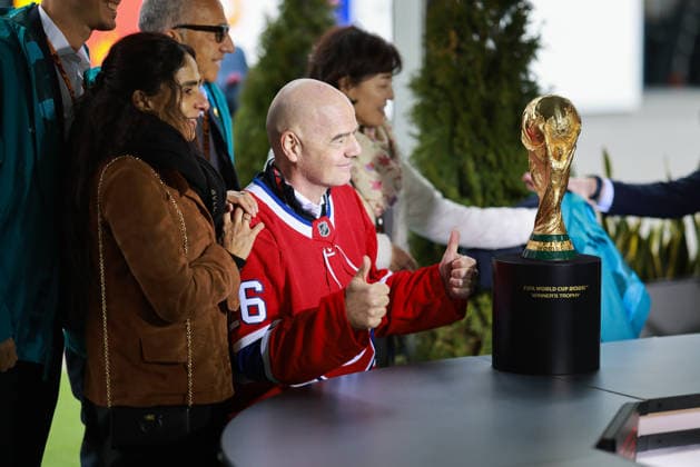 F1 Grand Prix Of Canada - President Of FIFA Gianni Infantino Visits Paddock Gianni Infantino, president of the International Federation of Association Football (FIFA), wears a Montreal Canadiens jersey as he speaks to the press with a 2026 FIFA World Cup, WM, Weltmeisterschaft, Fussball trophy during the Formula 1 Lenovo Grand Prix of Canada Driver s Parade at the Circuit Gilles Villeneuve in Montreal, Quebec, Canada, on May 24, 2026. Montreal, Quebec Canada Copyright: xReginaldxMathalonex originalFilename:mathalone-notitle260524_nprfc.jpg