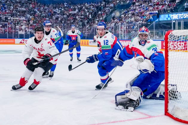 FRIBOURG, SWITZERLAND MAY 24 Macklin Celebrini of Canada L against Samuel Knazko of Slovakia C and goalkeeper Samuel Hlavaj of Slovakia R during the 2026 IIHF Ice Hockey World Championship Switzerland game between Slovakia and Canada at BCF Arena on May 24, 2026 in Fribourg, Fribourg Fribourg BCF Arena Fribourg Switzerland Copyright: xJustPictures.ch JarixPestelaccix jp-en-EuSpIm-JP6_JAR_Slovakia_Canada_24May2026_00037