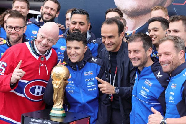 24 05 2026, Circuit Gilles Villeneuve, Montreal, FORMULA 1 LENOVO GRAND PRIX DU CANADA 2026 , in the picture FIFA President Gianni Infantino, Isack Hadjar FRA , Oracle Red Bull Racing, Ahmet Mercan Global Head of Corporate Projects in Motorsport at Red Bull with the World Cup trophy Photo by Mark Urquhart Hasan Bratic DeFodi Images