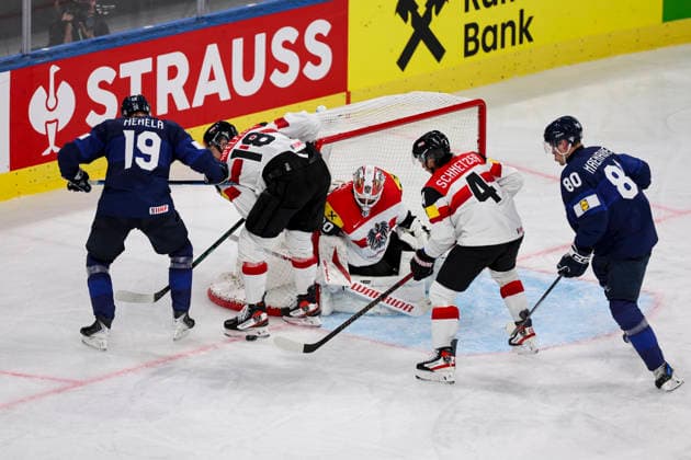 Ice hockey, Eishockey - IIHF WC 2026 ZURICH,SWITZERLAND,24.MAY.26 - ICE HOCKEY - IIHF Ice Hockey World Championship, WM, Weltmeisterschaft 2026, group stage, Austria vs Finland. Image shows Waltteri Merela (FIN), Paul Stapelfeldt, David Kickert, Ramon Schnetzer (AUT) and Saku Maenalanen (FIN). GEPAxpictures xMaticxKlansek