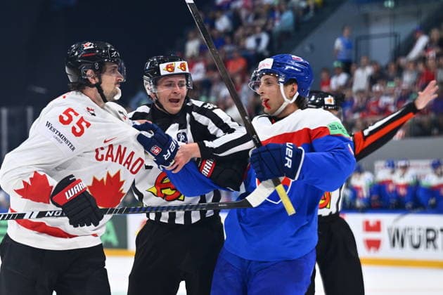 L-R Mark Scheifele (CAN) and Viliam Kmec (SVK) in action during to the group B match of the World Ice hockey, Eishockey Championship, Slovakia - Canada, Fribourg, Switzerland, on May 24, 2026. (CTKxPhoto RadekxPetrasek) CTKPhotoP2026052406815  CTKPhotoP2026052406815