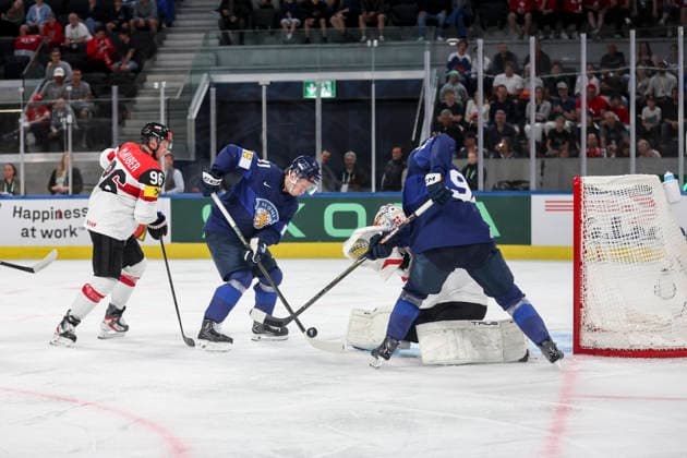 Ice hockey, Eishockey - IIHF WC 2026 ZURICH,SWITZERLAND,24.MAY.26 - ICE HOCKEY - IIHF Ice Hockey World Championship, WM, Weltmeisterschaft 2026, group stage, Austria vs Finland. Image shows Mario Huber (AUT), Patrik Puistola and Lenni Hameenaho (FIN).  GEPAxpictures xMaticxKlansek