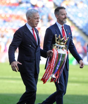 Football - 2025 2026 Premier League - Crystal Palace vs. Arsenal - Selhurst Park - Sunday 24th May 2026 American billionaire Stan Kroenke who owns Arsenal football club with his son, Josh Kroenke bring out the Premier league trophy for the Presentation 