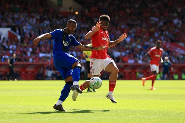 Nottingham, England, 24th May 2026. Rayan of AFC Bournemouth is challenged by Morgan Gibbs-White of Nottingham Forest during the Nottingham Forest vs AFC Bournemouth Premier League match at the City Ground, Nottingham. Picture credit should read: Jessica Hornby Sportimage EDITORIAL USE ONLY. No use with unauthorised audio, video, data, fixture lists, club league logos or live services. Online in-match use limited to 120 images, no video emulation. No use in betting, games or single club league player publications. SPI_076_JH_NOTTINGHAM_FOREST_BOURNEMOUTH SPI-4820-0076