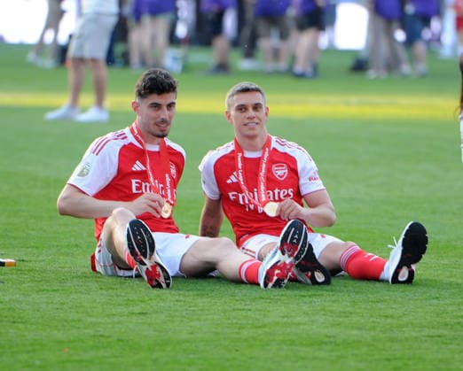 Football - 2025 2026 Premier League - Crystal Palace vs. Arsenal - Selhurst Park - Sunday 24th May 2026 Kai Havertz and Leandro Troussard of Arsenal with their winners medals 