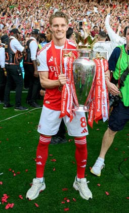23 May 2026 - Crystal Palace v Arsenal - Premier League - Selhurst Park - London. Crystal Palace v Arsenal - Premier League - Selhurst Park - London. Martin Odegaard celebrates with the Premier League trophy for Arsenal as they become the 2025 26 Champions. Picture : Mark Pain London England  Copyright: xMarkxPainx