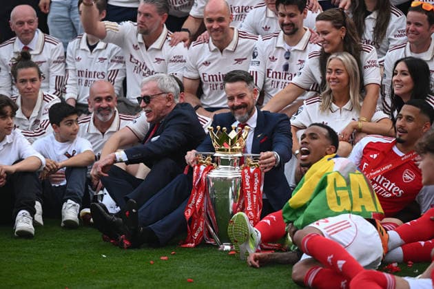 Crystal Palace v Arsenal Premier League Arsenal owner Stan Kroenke (left) and son Josh pictured with staff and players and the Premier League trophy during the Premier League match at Selhurst Park, London 24 05 2026 UK Newspapers OUT Copyright: xDanielxHamburyx FIL-23470-0336