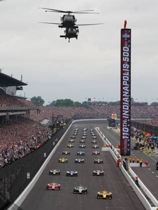 INDIANAPOLIS, IN - MAY 24: The 38th Combat Aviation Brigade from the Indiana National Guard flies over the IndyCar, Indy Car, IRL, USA drivers on the pace lap on the front straightaway during the 110th Running of the Indianapolis 500 on May 24, 2026, at the Indianapolis Motor Speedway in Indianapolis, Indiana. (Photo by Brian Spurlock Icon Sportswire) AUTO: MAY 24 NTT IndyCar Series Indianapolis 500 presented by Gainbridge EDITORIAL USE ONLY Icon26052450056