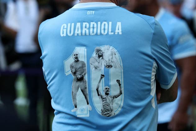 24th May 2026; Etihad Stadium, Manchester, Lancashire, England; Premier League Football, Manchester City versus Aston Villa; a Manchester City supporter wears a shirt celebrating Manchester City manager Pep Guardiola& x2019;s ten years at the club DavidxBlunsden