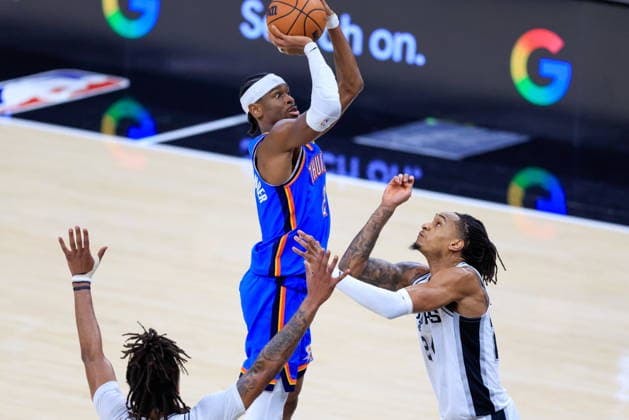 NBA, Basketball Herren, USA West Conference Finals Game 4 - Oklahoma City Thunder at San Antonio Spurs San Antonio Spurs guard Dylan Harper (C) takes a shot over San Antonio Spurs guard Stephon Castle (L) and San Antonio Spurs guard Devin Vassell (R) during game 4 of the NBA West Conference Finals between San Antonio Spurs and Oklahoma City Thunder in San Antonio, Texas, USA, 24 May 2026. San Antonio United States  Copyright: xADAMxDAVISx