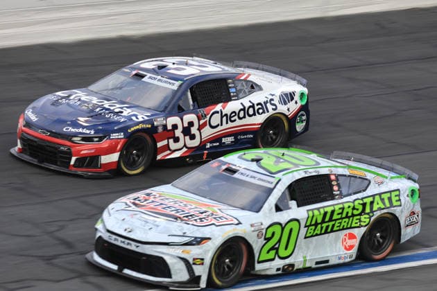 CHARLOTTE, NC - MAY 24: Christopher Bell ( 20 Joe Gibbs Racing Interstate Batteries Toyota) races with Austin Hill ( 33 Richard Childress Racing Cheddar s Scratch Kitchen Chevrolet) into turn 3 during the running of the NASCAR, Motorsport, USA Cup Series Coca-Cola 600 on May 24, 2026 at Charlotte Motor Speedway in Charlotte, NC. (Photo by Jeff Robinson Icon Sportswire) AUTO: MAY 24 NASCAR Cup Series Coca-Cola 600 EDITORIAL USE ONLY Icon2605247621600