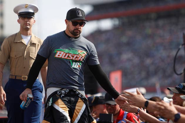 CHARLOTTE, NC - MAY 24: Ricky Stenhouse Jr ( 47 Hyak Motorsports Three Finger Jack Chevrolet) shakes hands with fans while wearing a Hat honoring the late Kyle Busch and a t-shirt with Brexton Busch s name on it prior to the running of the NASCAR, Motorsport, USA Cup Series Coca-Cola 600 on May 24, 2026 at Charlotte Motor Speedway in Charlotte, NC. (Photo by Jeff Robinson Icon Sportswire) AUTO: MAY 24 NASCAR Cup Series Coca-Cola 600 EDITORIAL USE ONLY Icon2605247820600