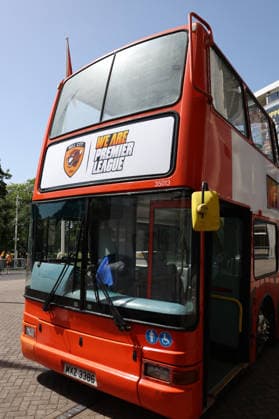 Hull Bus Parade General view of We Are Premier League written on one of the open top buses outside the MKM Stadium before the Hull City Bus Parade on the streets of Hull, England after being promoted to the Premier League in the Sky Bet Championship Play-Off Final on Saturday 23rd May 2026. 25 05 2026 UK Newspapers OUT Copyright: xAndyxSumnerx FIL-23472-0002