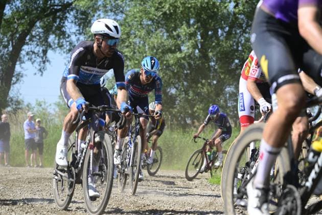 The pack of riders pictured in action during the Antwerp Port Epic men s elite one day cycling race, 196,4 km in and around Antwerp, Monday 25 May 2026. TOM GOYVAERTS TomxGoyvaerts  x175005938x