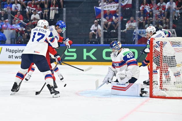 From left Eirik Salsten of Norway, Jaroslav Chmelar of Czech Republic and goalkeeper Henrik Haukeland of Norway in action during the IIHF World Championship, WM, Weltmeisterschaft Group B match Czech Republic vs Norway on May 25, 2026, Fribourg, Switzerland. (CTKxPhoto RadekxPetrasek) CTKPhotoP2026052505270  CTKPhotoP2026052505270