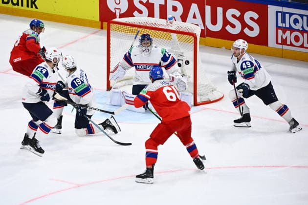 Martin Kaut of Czech Republic, center, and goalkeeper Henrik Haukeland of Norway in action during the IIHF World Championship, WM, Weltmeisterschaft Group B match Czech Republic vs Norway on May 25, 2026, Fribourg, Switzerland. At the right is Christian Kaasastul of Norway. (CTKxPhoto RadekxPetrasek) CTKPhotoP2026052506070  CTKPhotoP2026052506070