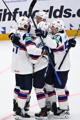 From left Andreas Martinsen, Kristian Ostby, Michael Brandsegg-Nygard and Sander Hurrod of Norway celebrate a goal during the IIHF World Championship, WM, Weltmeisterschaft Group B match Czech Republic vs Norway on May 25, 2026, Fribourg, Switzerland. (CTKxPhoto RadekxPetrasek) CTKPhotoP2026052506211  CTKPhotoP2026052506211