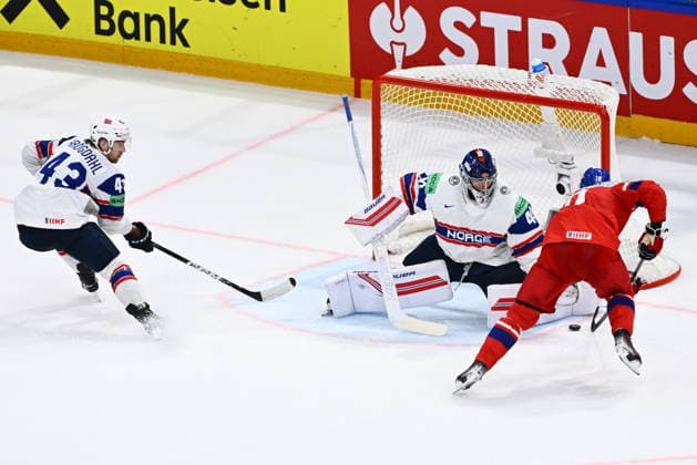 From left Max Krogdahl of Norway, goalkeeper Henrik Haukeland of Norway and Roman Cervenka of Czech Republic in action during the IIHF World Championship, WM, Weltmeisterschaft Group B match Czech Republic vs Norway on May 25, 2026, Fribourg, Switzerland. (CTKxPhoto RadekxPetrasek) CTKPhotoP2026052506347  CTKPhotoP2026052506347