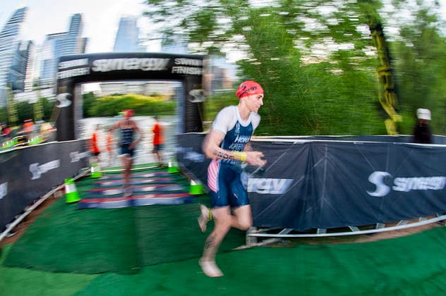 May 25, 2026: Gwen Jorgensen (203) finishing the swim at Lady Bird Lake, runs to bike transition in the womens Pro Sprint at the SuperTri. Austin, Texas. CSM. Austin United States of America - ZUMAc04_ 20260525_faf_c04_002 Copyright: xMarioxCantux