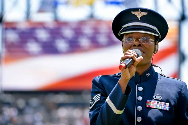 Staff Sgt Melan Smartt of the USAF sings the National Anthem before the Chicago White Sox take on the Minnesota Twins at Rate Field in Chicago, IL on Monday, May 25, 2026.  CHI20260525124 MARKxBLACK