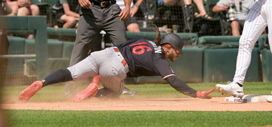 Minnesota Twins right fielder Austin Martin (16) steals third against the Chicago White Sox during the eighth inning at Rate Field in Chicago, IL on Monday, May 25, 2026. Sox defeated the Twins 3-1.  CHI20260525148 MARKxBLACK