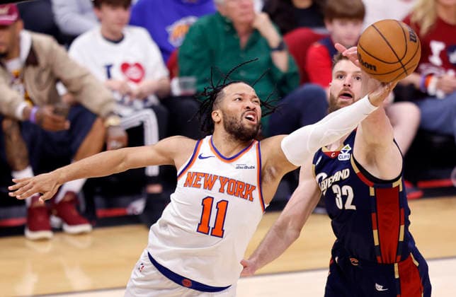 New York Knicks Jalen Brunson (11) has his shot blocked by Cleveland Cavaliers Dean Wade (32) in the first quarter of the Eastern Conference Final game 4 in Cleveland, Ohio Monday May 25, 2026.  CLE20260525106 AARONxJOSEFCZYK