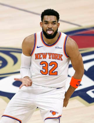 New York Knicks Karl-Anthony Towns reacts after hitting a three point shot against the Cleveland Cavaliers in the first quarter of the Eastern Conference Final game 4 in Cleveland, Ohio Monday May 25, 2026.  CLE20260525103 AARONxJOSEFCZYK