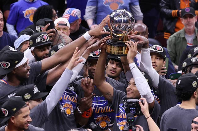 The New York Knicks celebrate a 130-93 win over the Cleveland Cavaliers in the Eastern Conference Final game 4 to win the series 4-0 in Cleveland, Ohio Monday May 25, 2026.  CLE20260525115 AARONxJOSEFCZYK