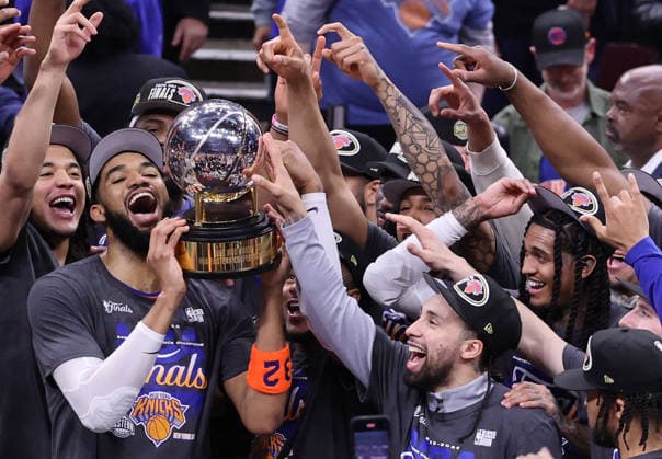 The New York Knicks celebrate a 130-93 win over the Cleveland Cavaliers in the Eastern Conference Final game 4 to win the series 4-0 in Cleveland, Ohio Monday May 25, 2026.  CLE20260525117 AARONxJOSEFCZYK