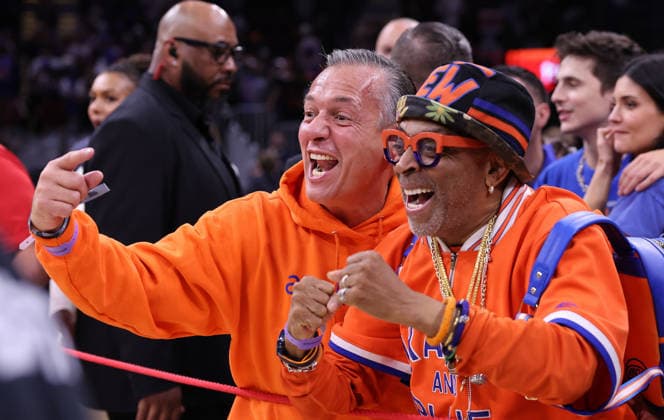 New York Knicks fan Spike Lee celebrates the Knicks 130-93 win over the Cleveland Cavaliers in the Eastern Conference Final game 4 to win the series 4-0 in Cleveland, Ohio Monday May 25, 2026.  CLE20260525119 AARONxJOSEFCZYK