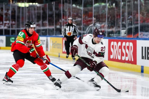 Ice hockey, Eishockey - IIHF WC 2026 ZURICH,SWITZERLAND,26.MAY.26 - ICE HOCKEY - IIHF Ice Hockey World Championship, WM, Weltmeisterschaft 2026, group stage, Hungary vs Latvia. Image shows Marton Nemes (HUN) and Sandis Vilmanis (LAT).  GEPAxpictures xMaticxKlansek