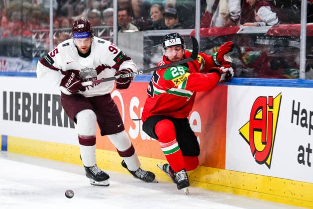 Ice hockey, Eishockey - IIHF WC 2026 ZURICH,SWITZERLAND,26.MAY.26 - ICE HOCKEY - IIHF Ice Hockey World Championship, WM, Weltmeisterschaft 2026, group stage, Hungary vs Latvia. Image shows Oskars Batna (LAT) and Gabor Tornyai (HUN).  GEPAxpictures xMaticxKlansek