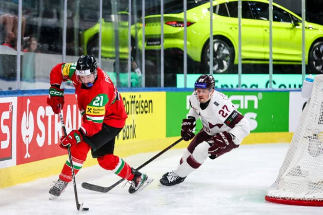 Ice hockey, Eishockey - IIHF WC 2026 ZURICH,SWITZERLAND,26.MAY.26 - ICE HOCKEY - IIHF Ice Hockey World Championship, WM, Weltmeisterschaft 2026, group stage, Hungary vs Latvia. Image shows Kristof Papp (HUN) and Oskars Cibulskis (LAT).  GEPAxpictures xMaticxKlansek