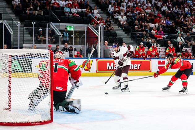 Ice hockey, Eishockey - IIHF WC 2026 ZURICH,SWITZERLAND,26.MAY.26 - ICE HOCKEY - IIHF Ice Hockey World Championship, WM, Weltmeisterschaft 2026, group stage, Hungary vs Latvia. Image shows Bence Balizs (HUN), Haralds Egle (LAT) and Csanad Erdely (HUN).  GEPAxpictures xMaticxKlansek