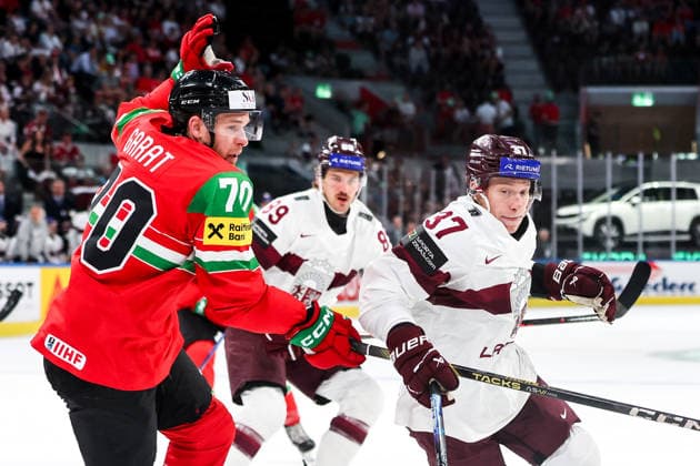 Ice hockey, Eishockey - IIHF WC 2026 ZURICH,SWITZERLAND,26.MAY.26 - ICE HOCKEY - IIHF Ice Hockey World Championship, WM, Weltmeisterschaft 2026, group stage, Hungary vs Latvia. Image shows Zsombor Garat (HUN) and Oskars Lapinskis (LAT).  GEPAxpictures xMaticxKlansek