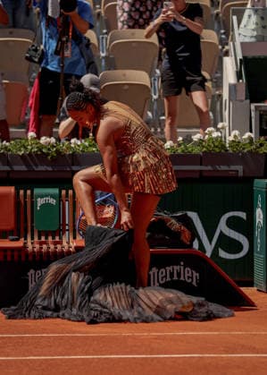Naomi Osaka of Japan wears a gold sequinned dress under a black sequinned long skirt and corset French Open Tennis, Day Three, Tennis, Roland Garros, Paris, France - 26 May 2026Paris Roland Garros France EDITORIAL USE ONLY No use with unauthorised audio, video, data, fixture lists, club league logos or live services. Online in-match use limited to 120 images, no video emulation. No use in betting, games or single club league player publications. Copyright: xEllaxLing Shutterstockx 16898259o