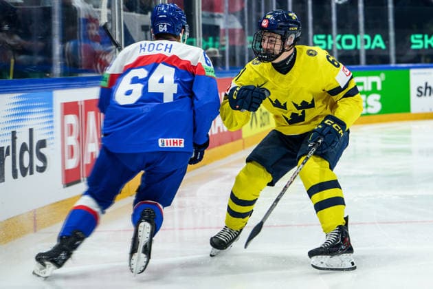 260526 Patrik Koch of Slovakia and Viggo Björck of Sweden during the 2026 IIHF Ice Hockey World Championship match between Sweden and Slovakia on May 26, 2026 in Fribourg Photo Jesper Zerman BILDBYRAN kod JZ JZ0730 ishockey ice hockey ishockey vm 2026 vm 2026 iihf world championship sverige sweden slovakien slovakia bbeng  Copyright: JESPERxZERMAN BB260526JZ034