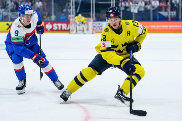 260526 Filip Mesar of Slovakia and Lucas Raymond of Sweden during the 2026 IIHF Ice Hockey World Championship match between Sweden and Slovakia on May 26, 2026 in Fribourg Photo Jesper Zerman BILDBYRAN kod JZ JZ0730 ishockey ice hockey ishockey vm 2026 vm 2026 iihf world championship sverige sweden slovakien slovakia bbeng  Copyright: JESPERxZERMAN BB260526JZ052