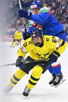 From left Viggo Bjorck of Sweden and Adam Liska of Slovakia in action during the IIHF World Championship, WM, Weltmeisterschaft Group B match Sweden vs Slovakia on May 26, 2026, Fribourg, Switzerland. (CTKxPhoto RadekxPetrasek) CTKPhotoP2026052606501  CTKPhotoP2026052606501
