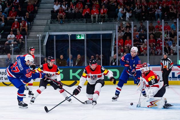 ZURICH, SWITZERLAND - MAY 26: Matt Coronato (United States, 27) shooting on the goal of Atte Tolvanen (Austria, 35) during the Preliminary Round - Group A Match 53 between United States and Austria at the IIHF Ice hockey, Eishockey World Championship, WM, Weltmeisterschaft 2026, Swiss Life Arena on May 26, 2026 in Zurich, Switzerland. Zurich Switzerland Copyright: xTimoxSteinx