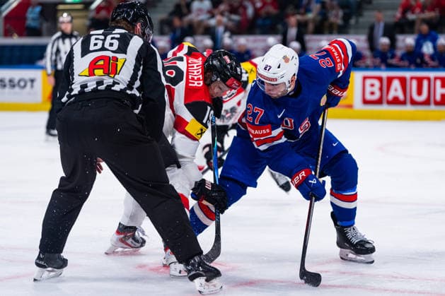 ZURICH, SWITZERLAND - MAY 26: Matt Coronato (United States, 27) in the battle for the puck with Vinzenz Rohrer (Austria, 19) during the Preliminary Round - Group A Match 53 between United States and Austria at the IIHF Ice hockey, Eishockey World Championship, WM, Weltmeisterschaft 2026, Swiss Life Arena on May 26, 2026 in Zurich, Switzerland. Zurich Switzerland Copyright: xTimoxSteinx