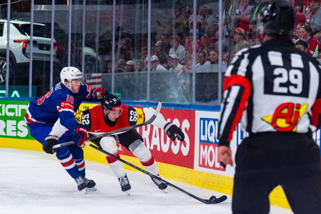 ZURICH, SWITZERLAND - MAY 26: Mason Lohrei (United States, 16) in the battle for the puck with Paul Huber (Austria, 52) during the Preliminary Round - Group A Match 53 between United States and Austria at the IIHF Ice hockey, Eishockey World Championship, WM, Weltmeisterschaft 2026, Swiss Life Arena on May 26, 2026 in Zurich, Switzerland. Zurich Switzerland Copyright: xTimoxSteinx
