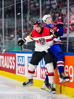 Ice hockey, Eishockey - IIHF WC 2026 ZURICH,SWITZERLAND,26.MAY.26 - ICE HOCKEY - IIHF Ice Hockey World Championship, WM, Weltmeisterschaft 2026, group stage, USA vs Austria. Image shows Paul Huber (AUT) and Mason Lohrei (USA).  GEPAxpictures xMaticxKlansek