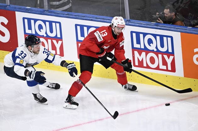 LKS 20260526 Nikolas Matinpalo (L) of Finland vies the puck with Nico Hischier of Switzerland during the 2026 IIHF Ice hockey, Eishockey World Championships preliminary round group A match between Switzerland and Finland in Zurich on May 26, 2026. - RONI REKOMAA Zürich Switzerland rAhE4XYwgQo  Copyright: xRonixRekomaax rAhE4XYwgQo