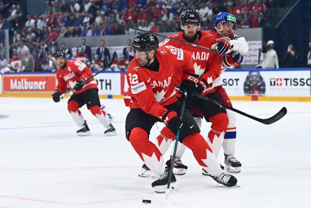 From left Evan Bouchard and Parker Wotherspoon of Canada and Roman Cervenka of Czech Republic in action during the IIHF World Championship, WM, Weltmeisterschaft Group B match Czech Republic vs Canada on May 26, 2026, Fribourg, Switzerland. (CTKxPhoto RadekxPetrasek) CTKPhotoP2026052608692  CTKPhotoP2026052608692