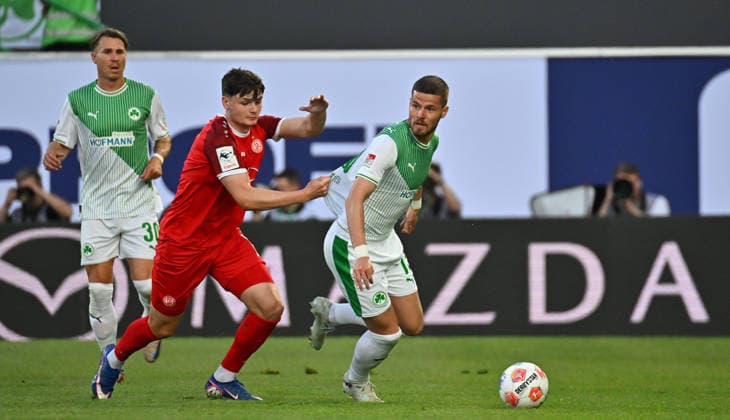26 05 2026 Soccer season 2025 2026 Relegation 2 Soccer Bundesliga second leg SpVgg Greuther Fürth Kleeblatt Rot Weiss Essen RWE Sportfoto Zink MeZi xmexzix DFL regulations prohibit any use of photographs as image sequences and or quasi video only for editorial use Jaka Cuber Potocnik 9, Rot Weiss Essen Jan Elvedi 15, SpVgg Greuther Fürth, right